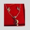 Juego pendientes y collar nota musical