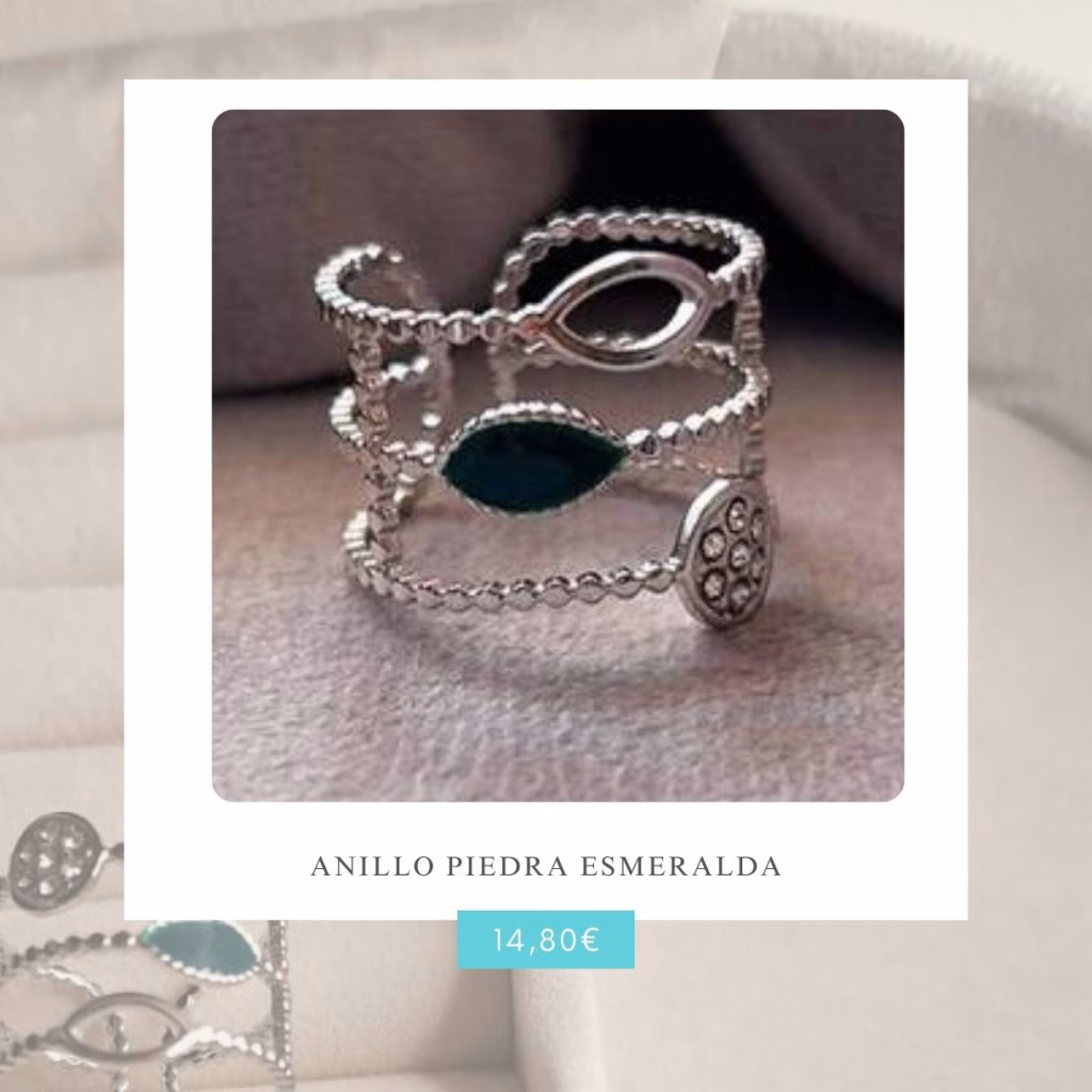 anillos de acero inoxidable y piedra esmeralda